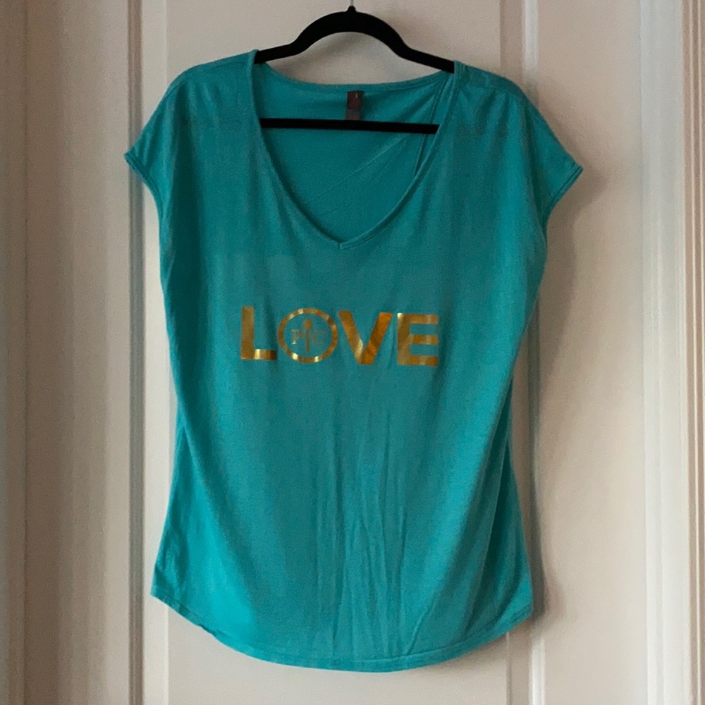 Pampered chef T-shirt with Tulip back